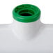 An Unger white and green plastic floor squeegee with a green cap.