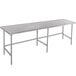 An Advance Tabco stainless steel work table with an open base and metal legs.