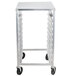 An Advance Tabco metal sheet pan rack with black wheels.