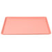 A pink rectangular Cambro dietary tray with a white border.