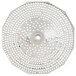 A circular metal cutting plate with small holes.