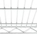 A close up of a Metro Super Erecta stainless steel wire shelf.