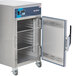 An Alto-Shaam stainless steel holding cabinet with a door open.