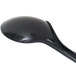 A black plastic spoon with a white background.