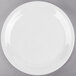 a white plate on a gray background