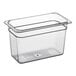 A Cambro clear plastic food pan on a counter.