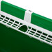 a close up of a green and white plastic container