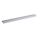 A True Refrigeration door sweep, a white rectangular metal strip.