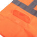 A Cordova orange safety vest with reflective stripes.