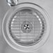 A stainless steel Delfield water station with a metal grid over a drain.