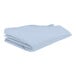 A stack of folded light blue Intedge table covers on a white background.