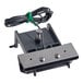 A black and silver Scotsman ice thickness sensor with a green wire.