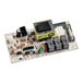 A close-up of a Manitowoc Ice control board with various electronic components.