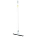 A white Unger SmartFit floor squeegee with a black telescoping handle.