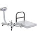 A Tor Rey digital receiving bench scale with a metal frame and stand.