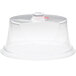 A clear plastic Cal-Mil Turn N Serve Colonial tray cover on a clear plastic tray.