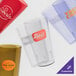 A group of Cambro clear plastic tumblers.