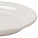 An ivory oval china platter with a narrow rim.