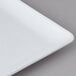 An American Metalcraft white square stoneware platter with a thin edge.