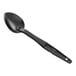 A black plastic spoon with a long handle.