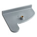A grey plastic corner with a hole on a metal shelf.
