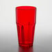 A red plastic GET Bahama tumbler on a white surface.