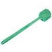 A green Carlisle Sparta pot scrub brush with a handle.