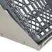 A white metal tubular rack shelf with a tray on top.