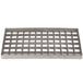 a metal grate with holes