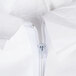 The open zipper on a white Cordova microporous coverall.