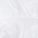 A close up of a white Cordova microporous coverall.