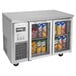 A Turbo Air undercounter refrigerator with two glass doors filled with drinks.