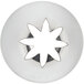A circular object with a star cutout in the center.