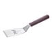 A Mercer Culinary Hell's Handle square edge turner with a purple handle.