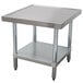 An Advance Tabco stainless steel mixer table with a galvanized undershelf.