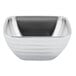 A silver Vollrath double wall metal bowl with a white background.