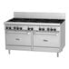 A large stainless steel Garland commercial gas range with 6 burners, a griddle, and 2 ovens.