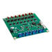 A green Hatco relay board with many small black and blue electronic components.