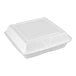 A Dart white foam food container with three compartments and a hinged lid.