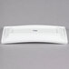 A white rectangular thick porcelain platter with the logo on it.