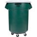 A green Rubbermaid BRUTE trash can with wheels.