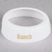 A white Tablecraft plastic dispenser collar with beige lettering reading "Ranch"