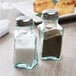 salt and pepper shakers on a table
