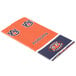 An orange and blue striped Creative Converting Auburn University plastic table cover with the Auburn University logo on it.