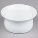 A white Libbey medium porcelain ramekin on a gray surface.