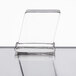 a clear glass object with a white background