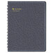 A black At-A-Glance class record book with blue writing on it.