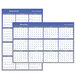 Two At-A-Glance blue and white reversible wall planners with calendars for 2025.