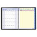 A black spiral bound At-A-Glance QuickNotes weekly/monthly calendar page with a few days of the week.
