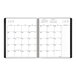 A black At-A-Glance monthly planner calendar page with white numbers for January 2025.